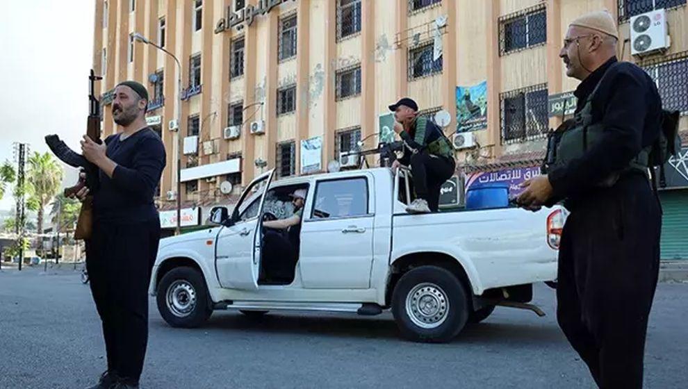 Suriye yönetimiyle çatışan gruptan YPG/PKK'nın işgal sahasına bağlantı talebi